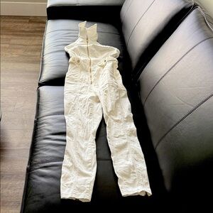 bebe Ivory High-Neck Jumpsuit